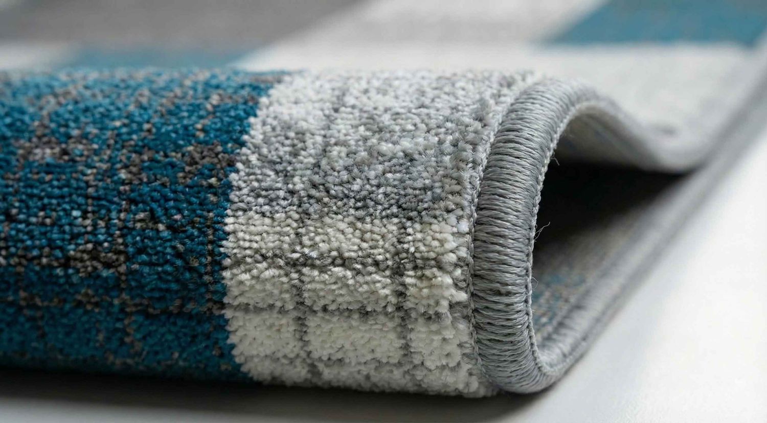 Designer short-pile rug in turquoise, grey and white with tile look for living room-zoom-6