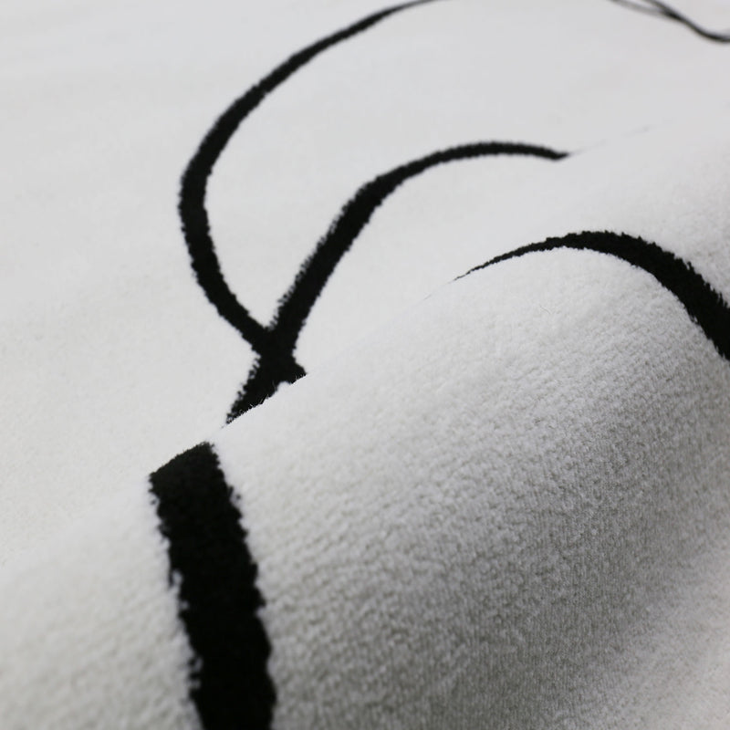 Modern one-line living room rug in cream/black, art design, short pile-zoom-
