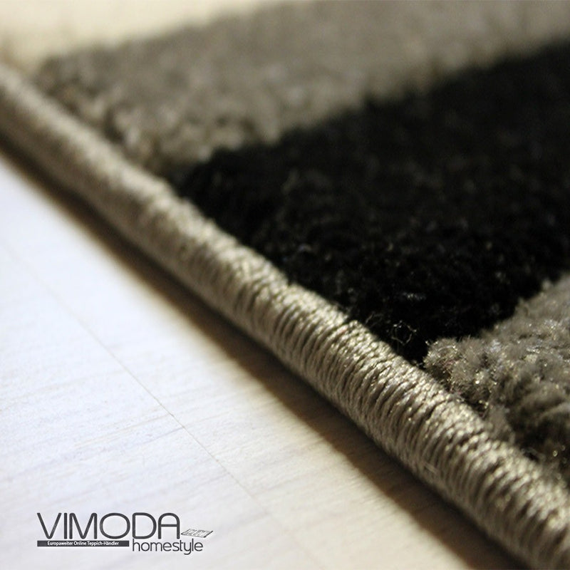Designer rug with curved lines in grey, white and black. Harmonious.-zoom-