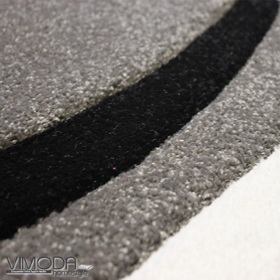 Designer rug with curved lines in grey, white and black. Harmonious.-2