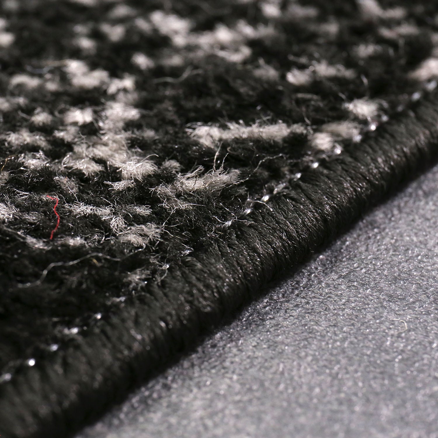 Short-pile rug with a modern star pattern in black, suitable for teenagers' rooms, children's rooms, and living rooms.-3