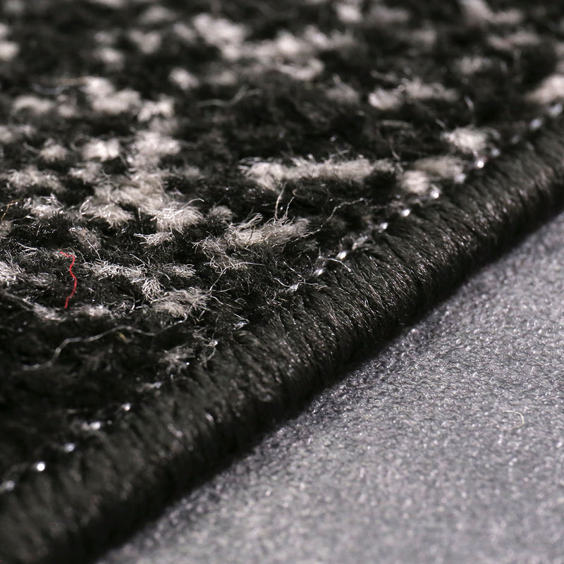 Short-pile rug with a modern star pattern in black, suitable for teenagers' rooms, children's rooms, and living rooms.-zoom-