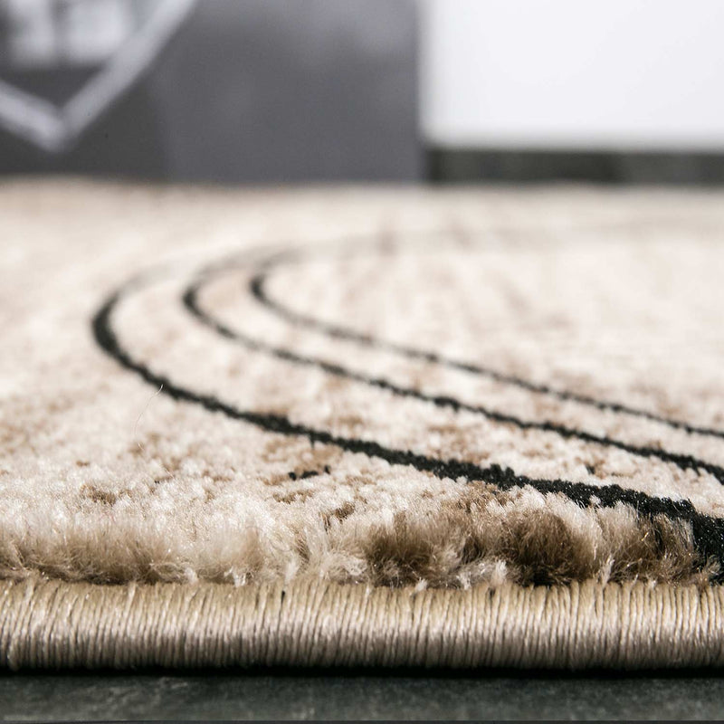 Modern short-pile rug, very densely woven, with a circular pattern, mottled in brown and beige.-zoom-