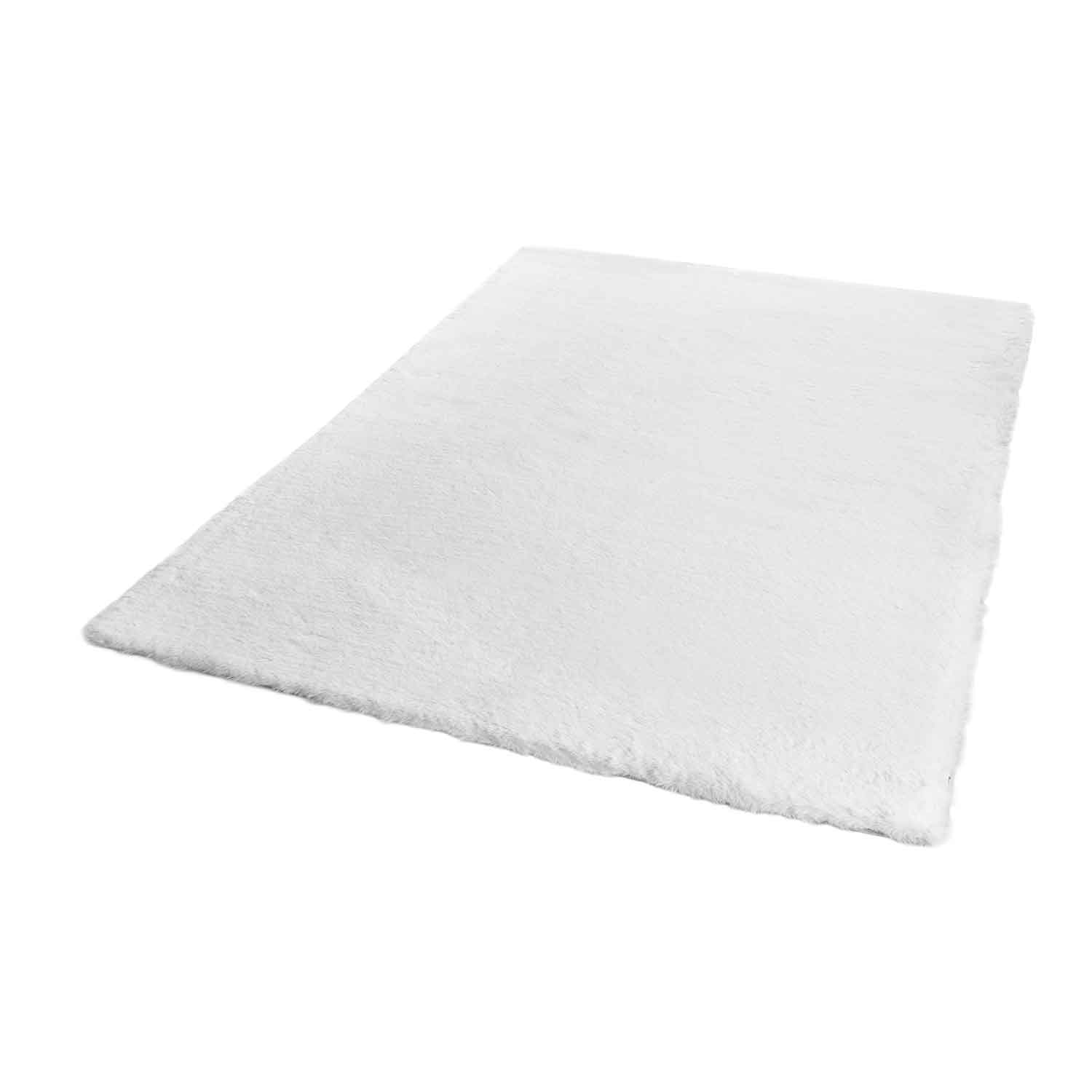 Faux fur rug in cream, dense, fluffy, silky sheen