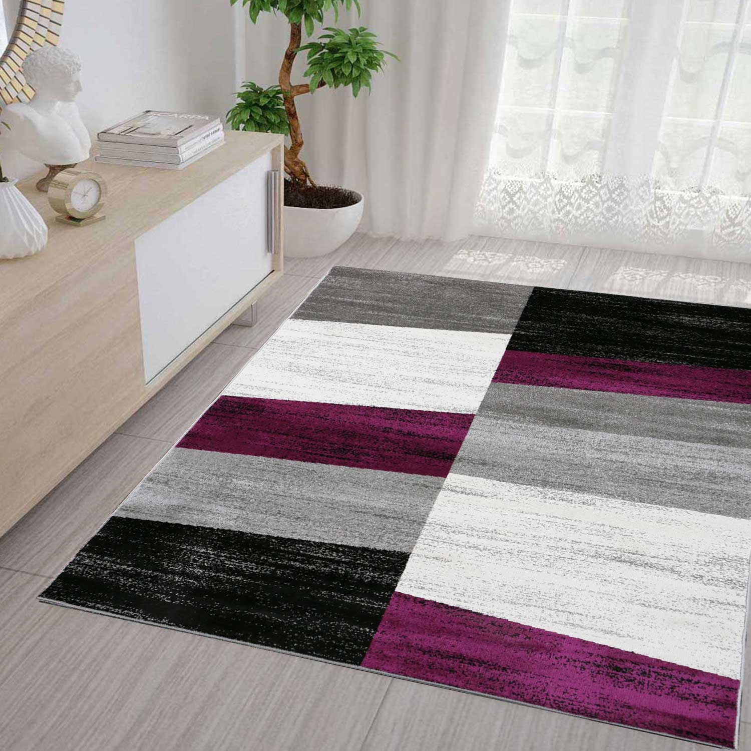 Rug with geometric tile pattern, mottled checkered in purple, grey, white and black