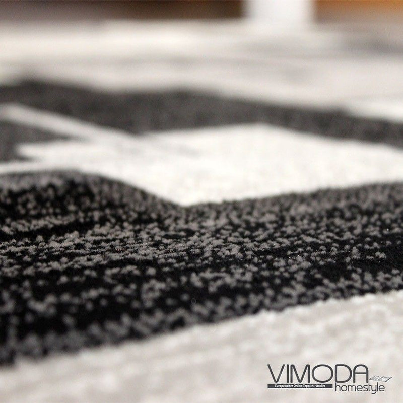 Designer living room rug, grey anthracite checkered retro with geometric motifs and color gradient-zoom-