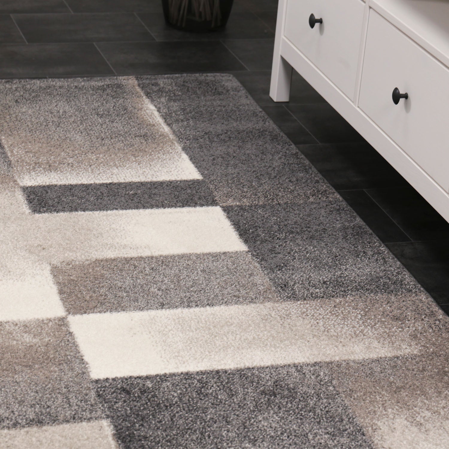 Modern designer rug with geometric abstract pattern in grey and beige
