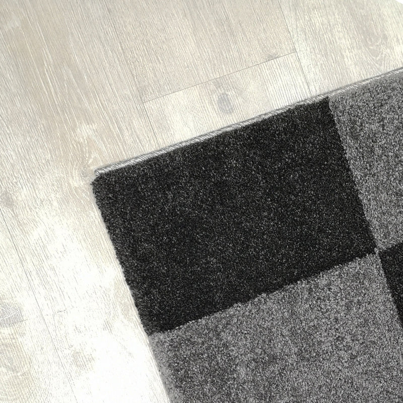 Teppich modern kariert patchwork rosa pink schwarz grau anthrazit mit Konturenschnitt Wohnzimmer-zoom-