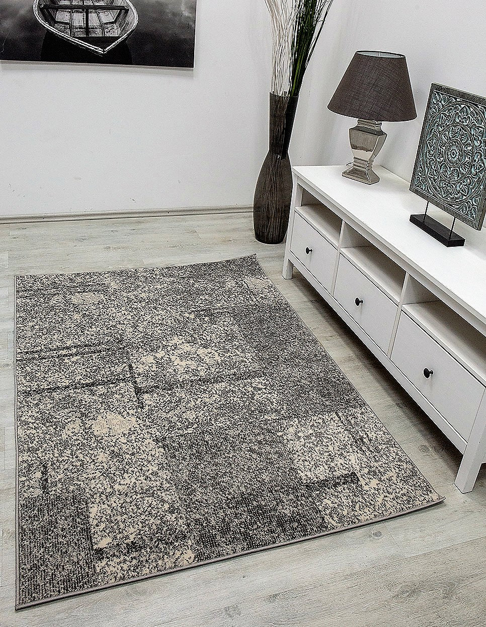 Modern checkered abstract design rug in grey and blue mottled with color gradient for living room or youth room