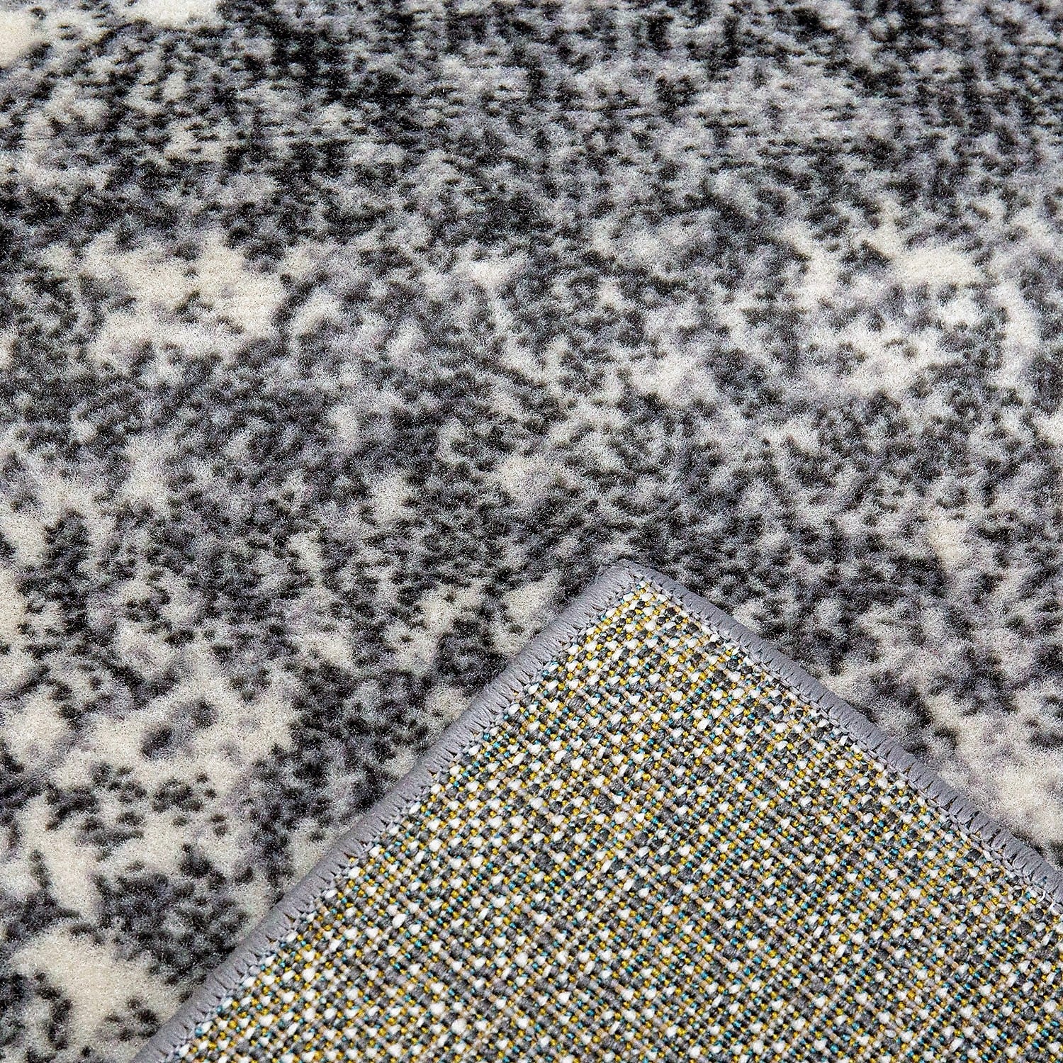 Modern checkered abstract design rug in grey and blue mottled with color gradient for living room or youth room