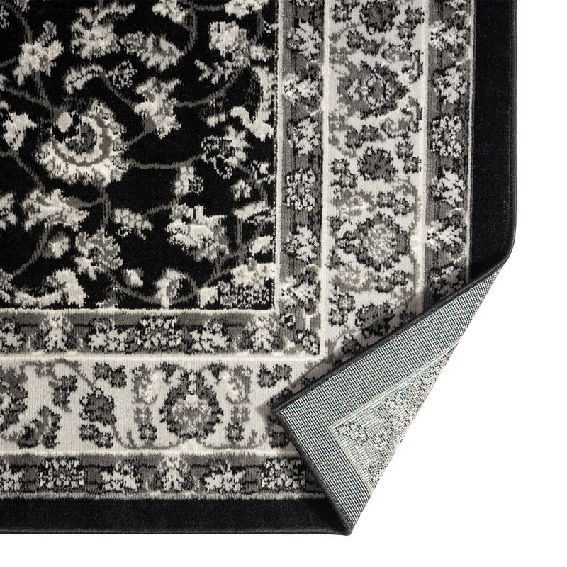 Oriental rug, grey and black, classically densely woven with ornament and floral motifs.-zoom-