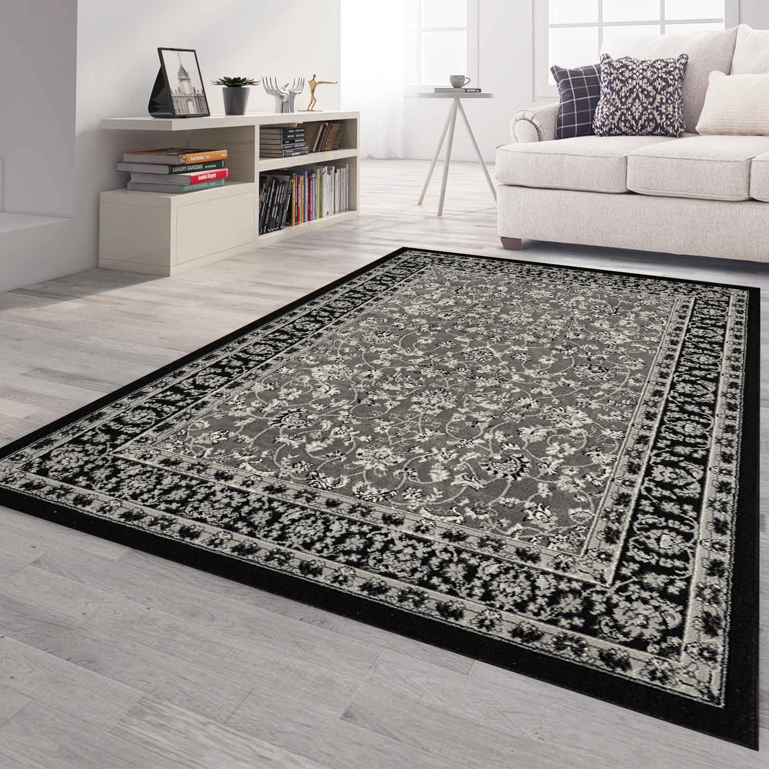 Oriental rug, grey and black, classically densely woven with ornament and floral motifs.-zoom-1