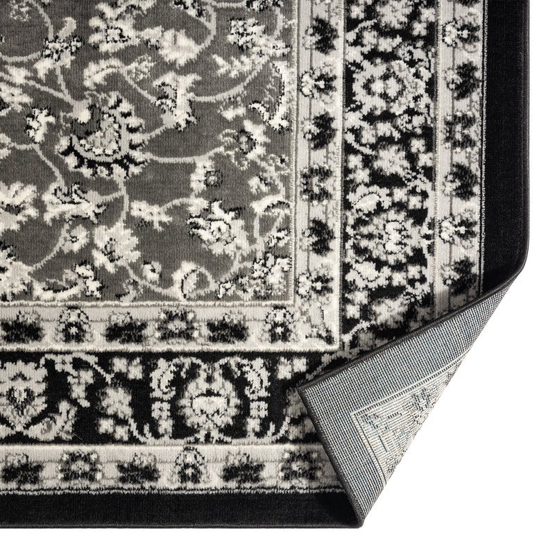 Oriental rug, grey and black, classically densely woven with ornament and floral motifs.-zoom-