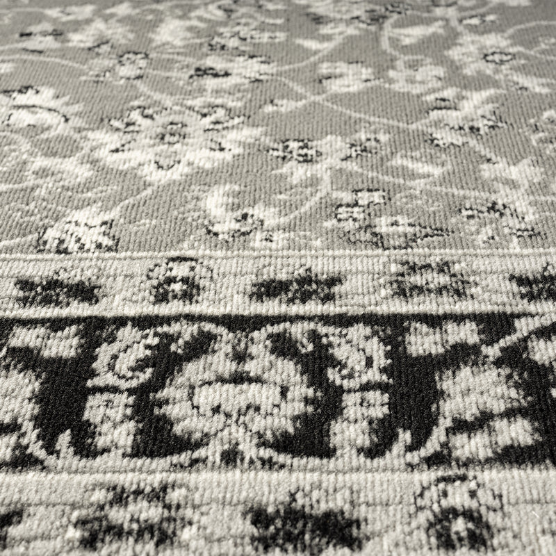 Oriental rug, grey and black, classically densely woven with ornament and floral motifs.-zoom-
