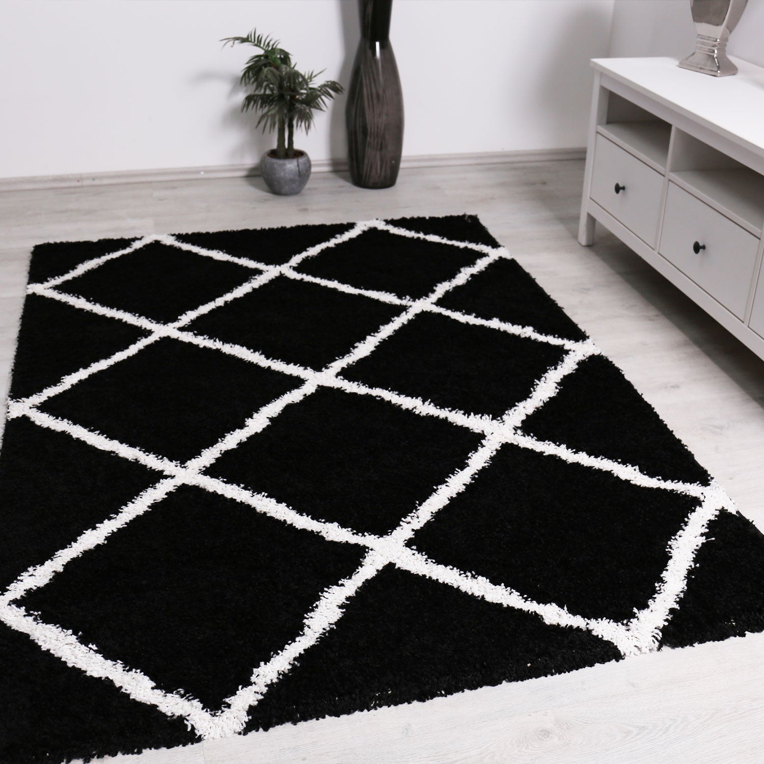 High-pile rug, living room, shaggy diamond pattern, black and cream, Scandinavian design, soft, ethnic