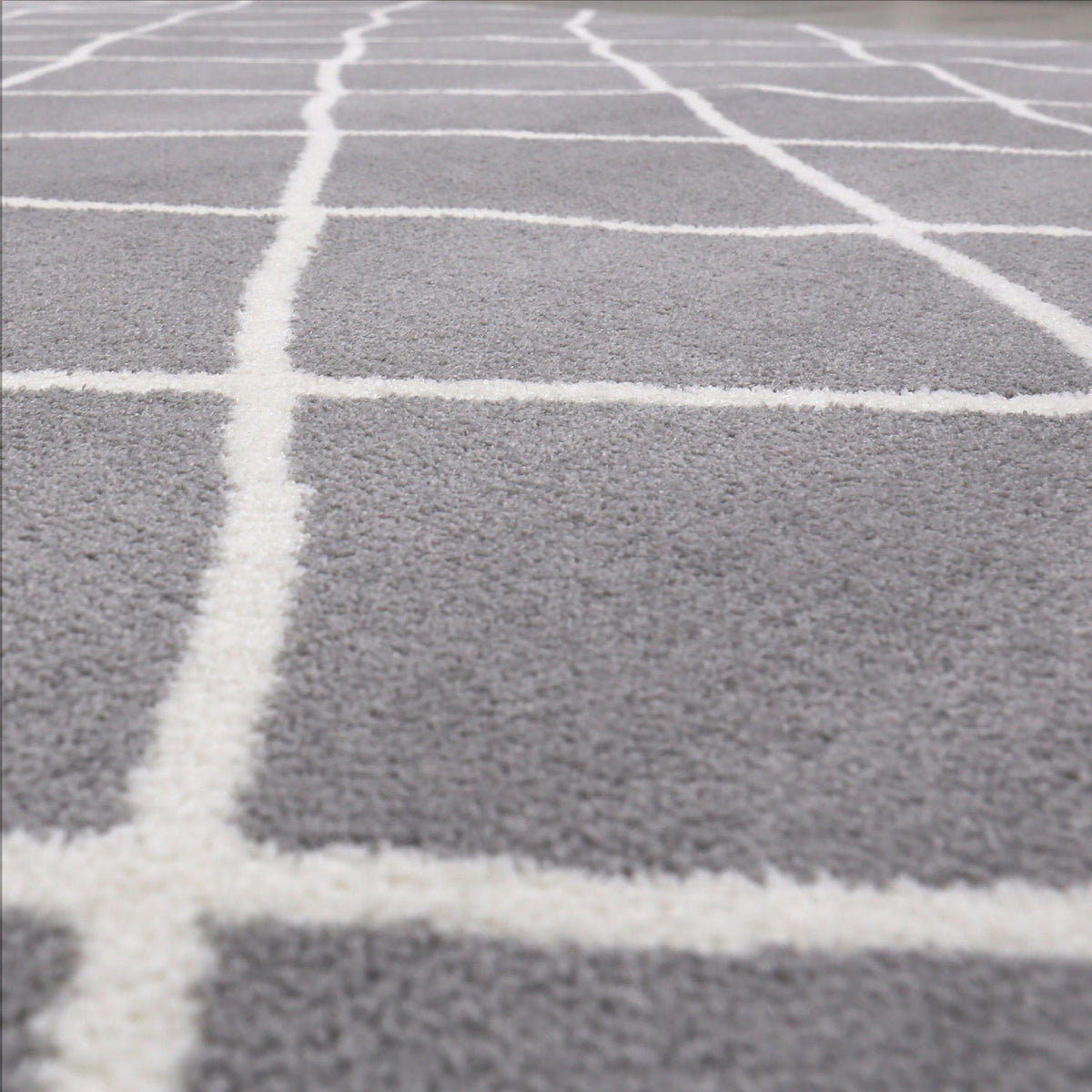 Designer rug in grey and white, fluffy microfiber, densely woven, Moroccan pattern