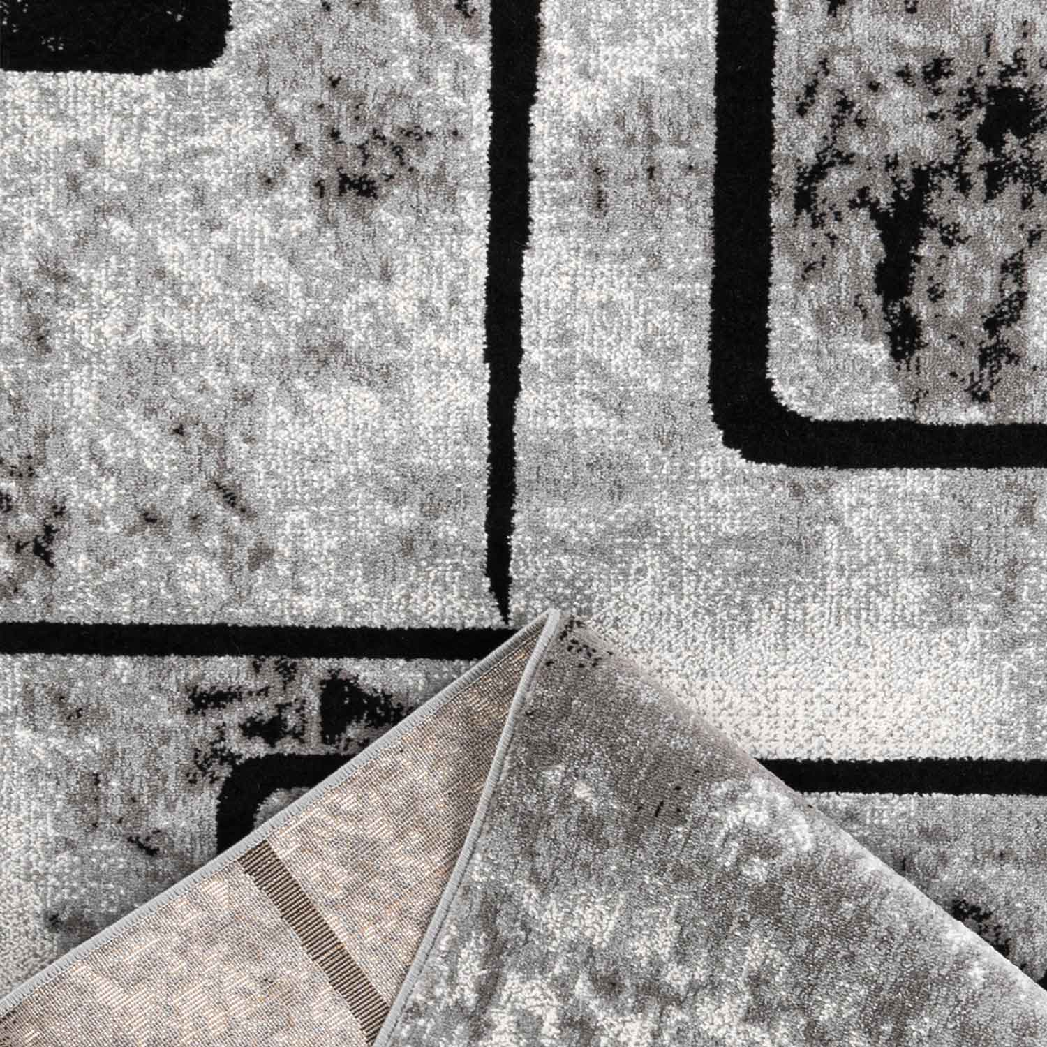 Grey living room rug, short pile, geometric pattern, abstract, mottled