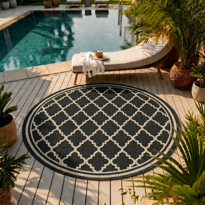 Indoor and outdoor flatweave carpet for patios, balconies, and conservatories; durable, with a Moroccan-inspired design-zoom-