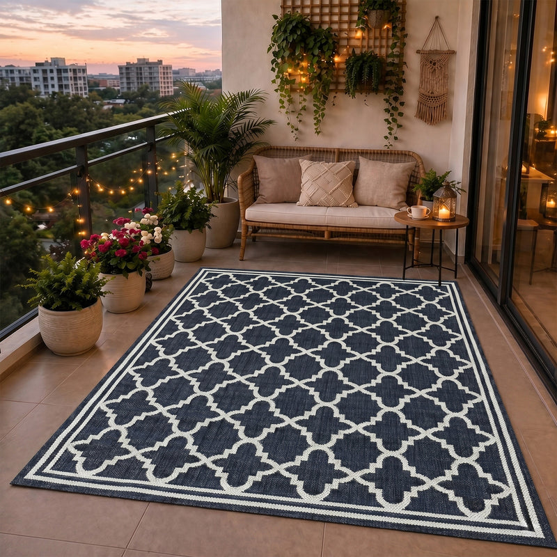 Indoor and outdoor flatweave carpet for patios, balconies, and conservatories; durable, with a Moroccan-inspired design-zoom-