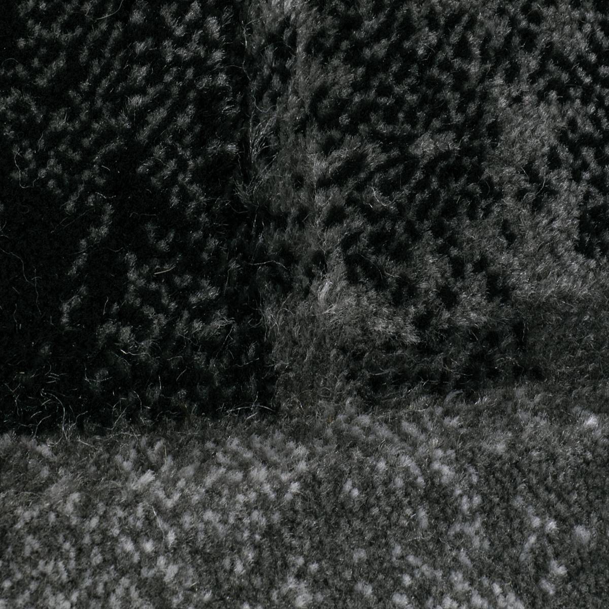 Designer living room rug, grey checkered with color gradient and contour cut